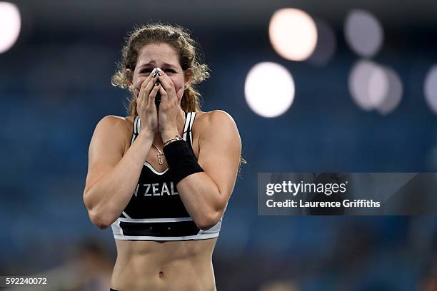 Eliza Mccartney of New Zealand celebrates winning bronze in the Women's Pole Vault Final on Day 14 of the Rio 2016 Olympic Games at the Olympic...