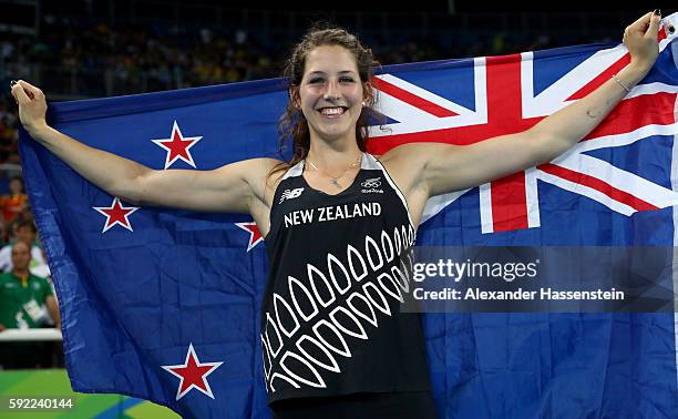 Eliza Mccartney of New Zealand celebrates winning bronze in the Women's Pole Vault Final on Day 14 of the Rio 2016 Olympic Games at the Olympic...