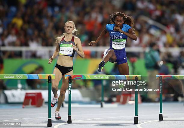 Sage Watson of Canada and Dalilah Muhammad of the United States compete in the Women's 400m Hurdles semifinal on Day 11 of the Rio 2016 Olympic Games...