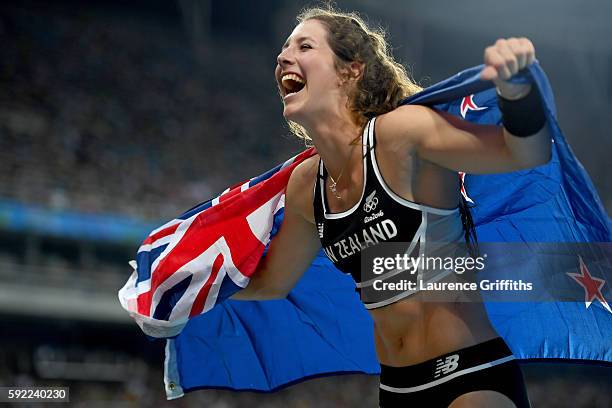 Eliza Mccartney of New Zealand celebrates winning bronze in the Women's Pole Vault Final on Day 14 of the Rio 2016 Olympic Games at the Olympic...