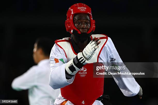 Cheick Sallah Cisse of Cote d'Ivoire celebrates winning the Men's Taekwondo -80kg Gold Medal Contest match against Lutalo Muhammad of Great Britain...