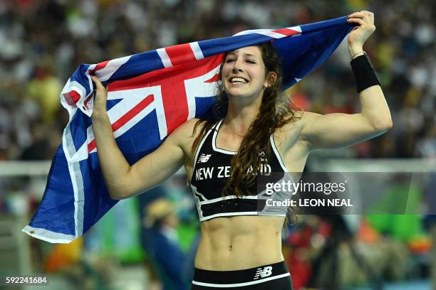 New Zealand's Eliza McCartney celebrates after she won the bronze medal in the Women's Pole Vault Final during the athletics event at the Rio 2016...