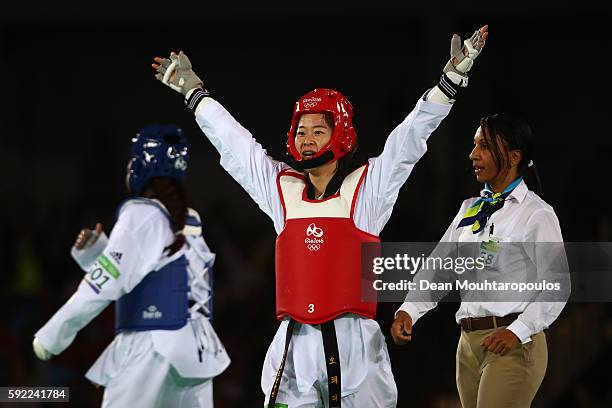 Hyeri Oh of South Korea celebrates winning the Women's Taekwondo -67kg Gold Medal Contest match against Haby Niare of France on Day 14 of the Rio...