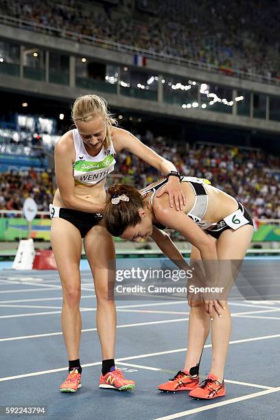 Jennifer Wenth of Austria and Nikki Hamblin of New Zealand react after the Women's 5000m Final and setting a new Olympic record of 14:26.17 on Day 14...