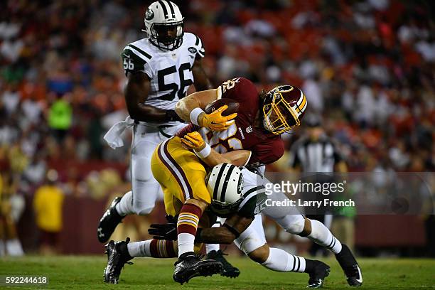 Tight end Logan Paulsen of the Washington Redskins runs the ball against the New York Jets at FedExField on August 19, 2016 in Landover, Maryland....