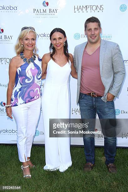 Ann Liguori, Georgina Bloomberg, and Matthew Breitenbach attend the Hamptons Magazine Fall Fashion Issue Event at Private Estate on August 19, 2016...