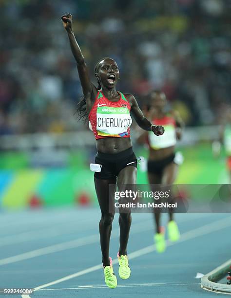 Viviian Jepkemoi Cheruiyot of Kenya celebrates winning the Women's 5000m Final on Day 14 of the Rio 2016 Olympic Games at the Olympic Stadium on...