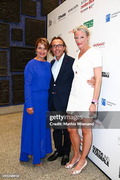 Jenny Juergens, Thomas Druyen and Constance Bruhns attend the Herzwerk Vernissage 'auf den 2ten Blick' at City Hall on August 19, 2016 in...