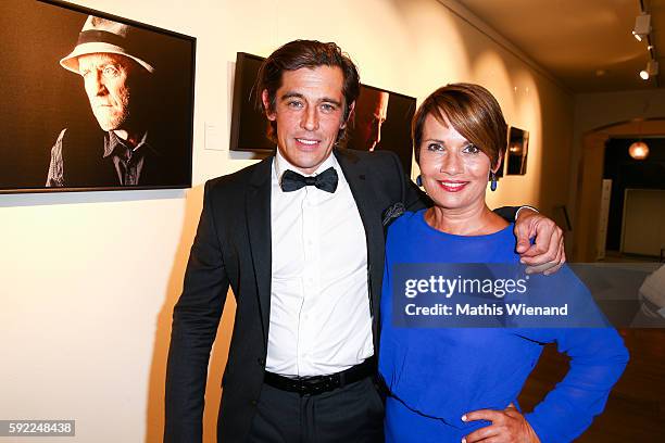 Jenny Juergens and Werner Schreyer attend the Herzwerk Vernissage 'auf den 2ten Blick' at City Hall on August 19, 2016 in Duesseldorf, Germany.