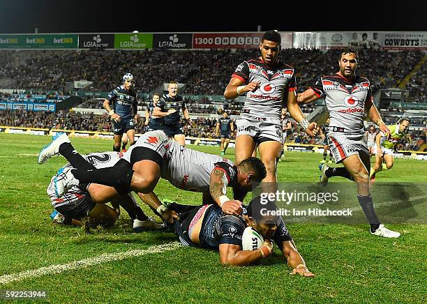 Justin O'Neil of the Cowboys scores a try during the round 24 NRL match between the North Queensland Cowboys and the New Zealand Warriors at...