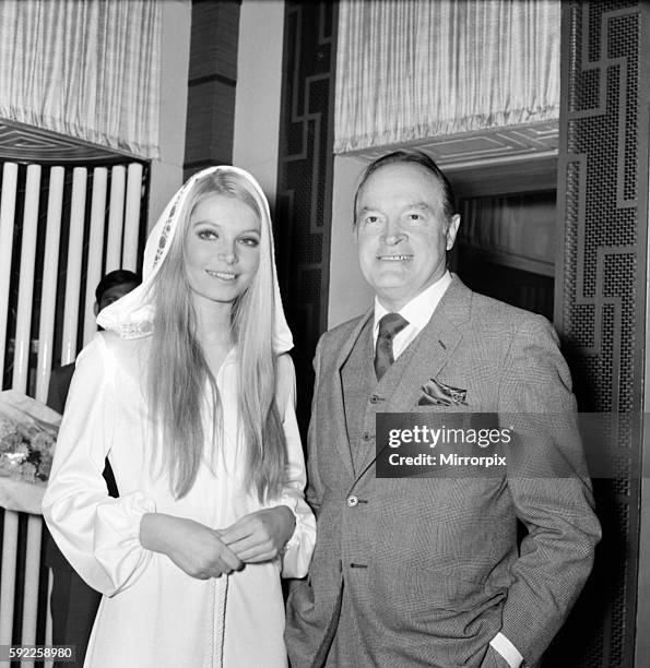 Bob Hope with Eva Rueber-Staier, Miss World. December 1969 Z11682-003