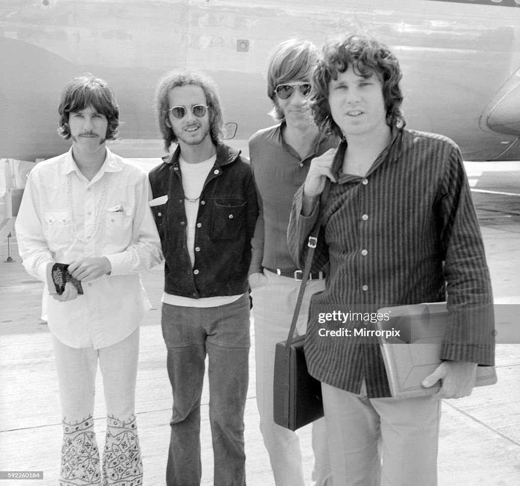 American rock group The Doors arrive at London's Heathrow airport. They are left to right: drummer John Densmore, guitar