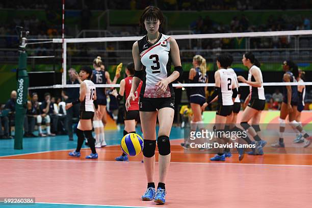 Saori Kimura of Japan prepares to serve during the Women's Quarterfinal match between Japan and The United States on day 11 of the Rio 2106 Olympic...