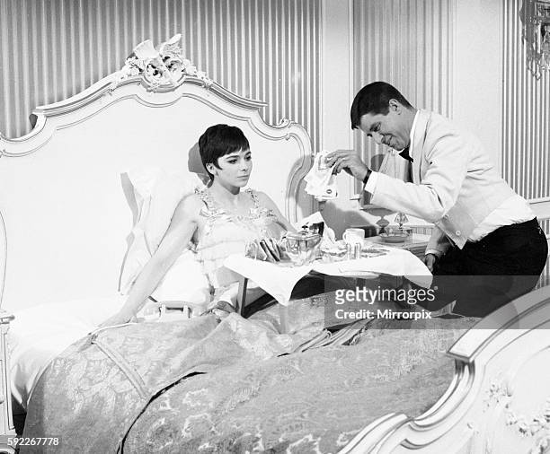 American actor and comedian Jerry Lewis seen here with actress Jacqueline Pearce during a breakin filming "Don't Raise the Bridge, Lower the River"...