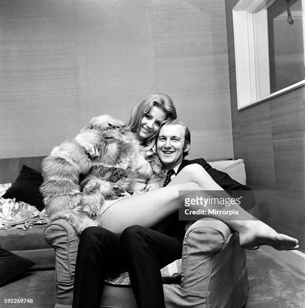 Actress Vicki Hodge with her advertising executive fiance Ian Heath at Ian's home in Belgravia. November 1969 Z11358-003