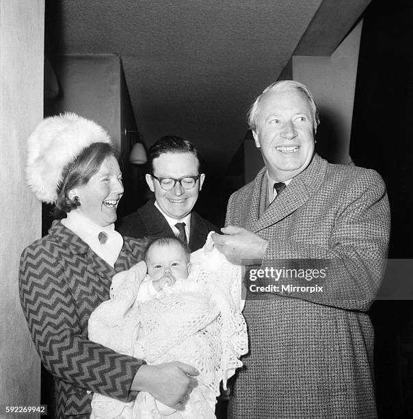Edward Heath, leader of the Conservative Party, was godfather for the fourteenth time . It was the turn of five-month old Catriona, 3rd child of his...
