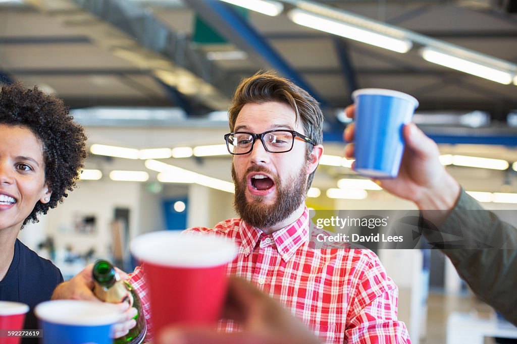 Business people toasting at office party