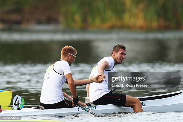 Sebastian Brendel of Germany and Jan Vandrey of Germany celebrate winning the Men's Canoe Double 1000m on Day 15 of the Rio 2016 Olympic Games at the...