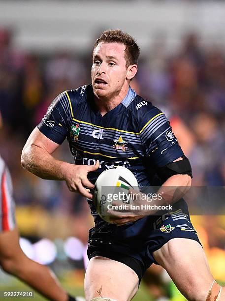 Michael Morgan of the Cowboys runs the ball during the round 24 NRL match between the North Queensland Cowboys and the New Zealand Warriors at...
