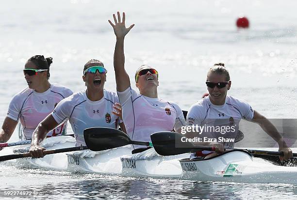 Team Hungary celebrates winning the gold medal in the Women's Kayak Four 500m Finals on Day 15 of the Rio 2016 Olympic Games at the Lagoa Stadium on...