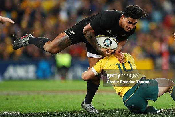 Malakai Fekitoa of the All Blacks is tackled by Bernard Foley of the Wallabies during the Bledisloe Cup Rugby Championship match between the...