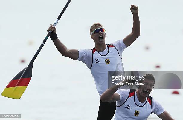 Jan Vandrey and Sebastian Brendel of Germany celebrate winning the gold medal in the Men's Canoe Double 1000m Finals on Day 15 of the Rio 2016...