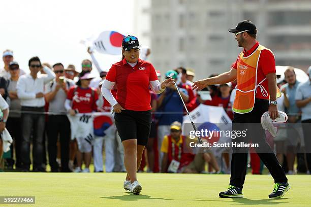 Inbee Park of Korea reacts on the fifth green during the Women's Golf Final on Day 15 of the Rio 2016 Olympic Games at the Olympic Golf Course on...