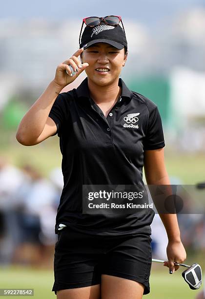 Lydia Ko of New Zealand reacts to her birdie on the seventh green during the Women's Golf Final on Day 15 of the Rio 2016 Olympic Games at the...