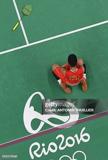 An overview shows China's Chen Long reacts after winning against Malaysia's Lee Chong Wei during their men's singles Gold Medal badminton match at...