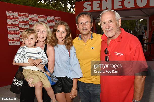 Kris Douilly and kid, Mathilde Laffont, Edouard DidierÊDouilly and TV presenter Patrice Laffont attend theTrophee Senequier At Place des Lices on...