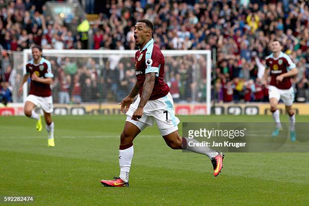 Andre Gray of Burnley celebrates scoring his sides second goal during the Premier League match between Burnley and Liverpool at Turf Moor on August...