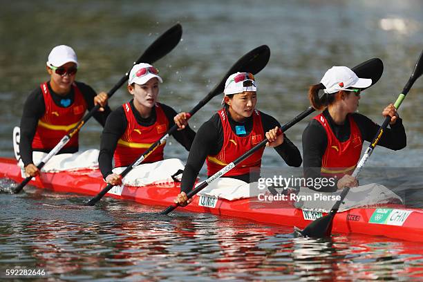 Wenjun Ren of China, Qing Ma of China, Yue Li of China and Haiping Liu of China compete in the Women's Kayak Four 500m on Day 15 of the Rio 2016...