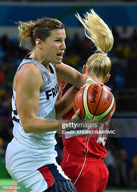 France's guard Gaelle Skrela vies withe Serbia's point guard Milica Dabovic during a Women's Bronze medal basketball match between France and Serbia...