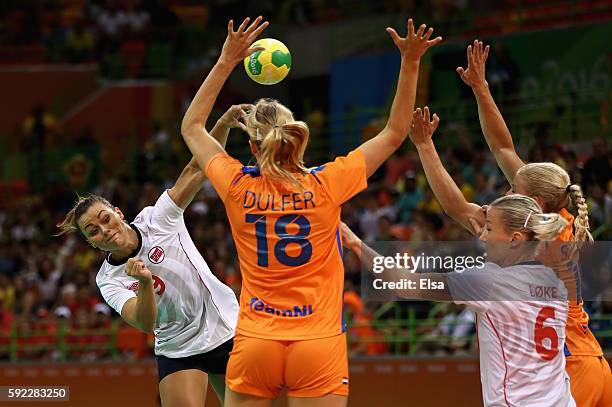 Nora Mork of Norway takes a shot during the Women's Handball Bronze medal match between Netherlands and Norway at Future Arena on Day 15 of the Rio...