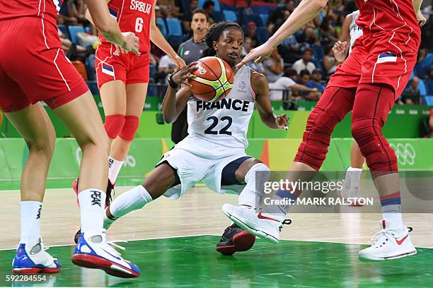 France's point guard Olivia Epoupa falls during a Women's Bronze medal basketball match between France and Serbia at the Carioca Arena 1 in Rio de...