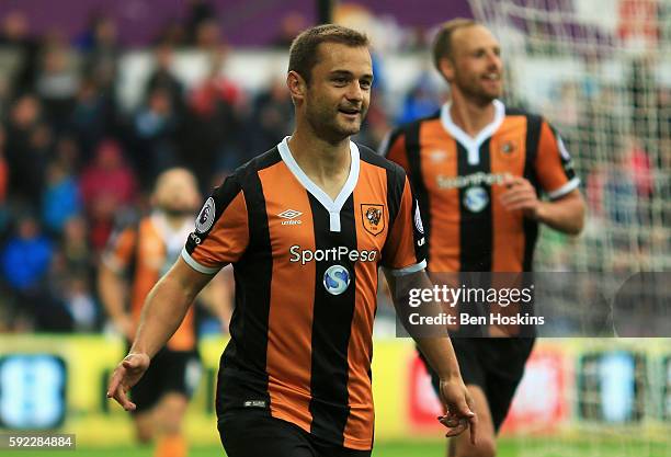 Shaun Maloney of Hull City celebrates scoring his sides first goal during the Premier League match between Swansea City and Hull City at Liberty...