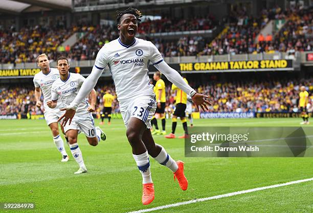 Michy Batshuayi of Chelsea celebrates scoring his sides first goal during the Premier League match between Watford and Chelsea at Vicarage Road on...