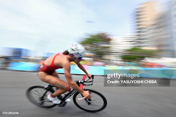 Switzerland's Nicola Spirig competes in the cycling portion of the women's triathlon at Fort Copacabana during the Rio 2016 Olympic Games in Rio de...