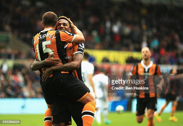 Shaun Maloney of Hull City and Abel Hernandez of Hull City celebrates scoring his sides second goal during the Premier League match between Swansea...