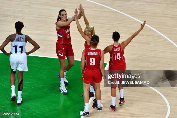 Serbia's shooting guard Ana Dabovic, Serbia's power forward Jelena Milovanovic, Serbia's point guard Milica Dabovic and Serbia's forward Sonja...