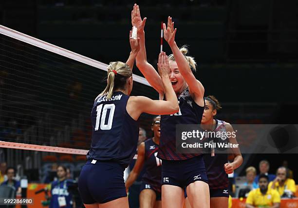 Kimberly Hill and Jordan Larson-Burbach of United States celebrate a point during the Women's Bronze Medal Match between Netherlands and the United...