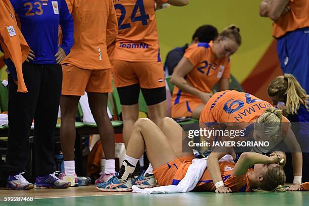 Netherlands' centre back Nycke Groot and Netherlands' left back Estavana Polman react after being defeated by Norway at the end of the women's Bronze...