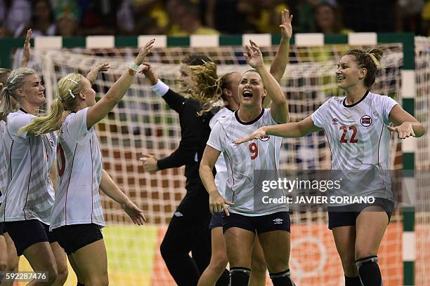 Norway's left back Veronica Kristiansen, Norway's centre back Stine Bredal Oftedal, Norway's right back Nora Mork and Norway's right wing Amanda...