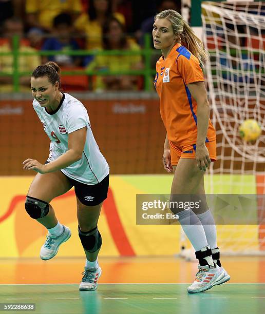 Nora Mork of Norway and Sanne van Olphen of Netherlands react during the Women's Handball Bronze medal match between Netherlands and Norway at Future...