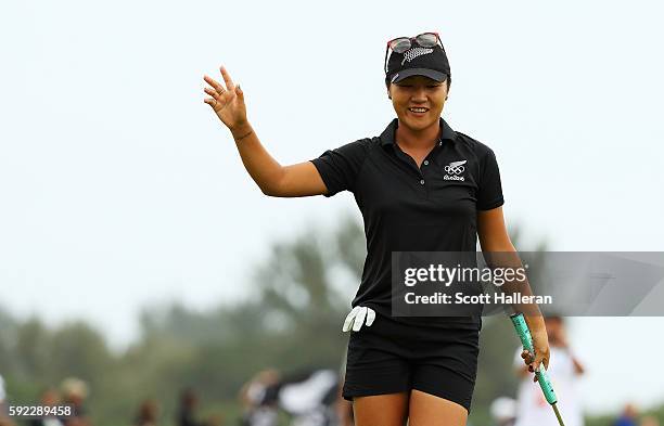 Lydia Ko of New Zealand reacts after putting for birdie on the 18th green to win silver during the Women's Golf Final on Day 15 of the Rio 2016...