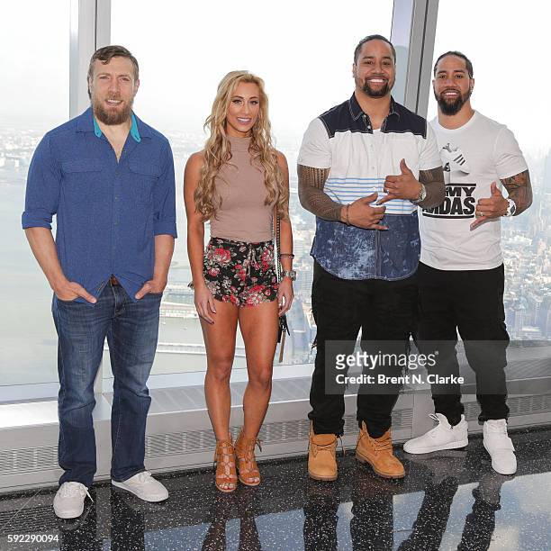 General manager of SmackDown Daniel Bryan, WWE superstars Carmella, Jimmy Uso and Hall of Famer Jey Uso pose for photographs during their visit to...