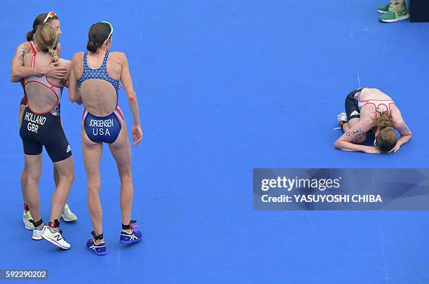 Gold medal winner USA's Gwen Jorgensen , bronze medalist Britain's Vicky Holland , and silver medalist Switzerland's Nicola Spirig stand together as...