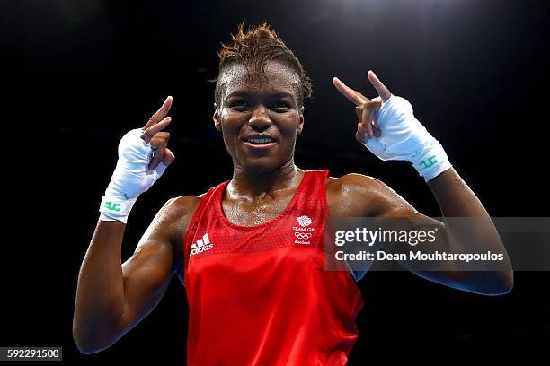 Nicola Adams of Great Britain celebrates winning the gold during the Women's Fly Final Bout against Sarah Ourahmoune of France on Day 15 of the Rio...