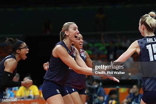 Jordan Larson-Burbach, Kimberly Hill of United States celebrate winning the third set during the Women's Bronze Medal Match between Netherlands and...