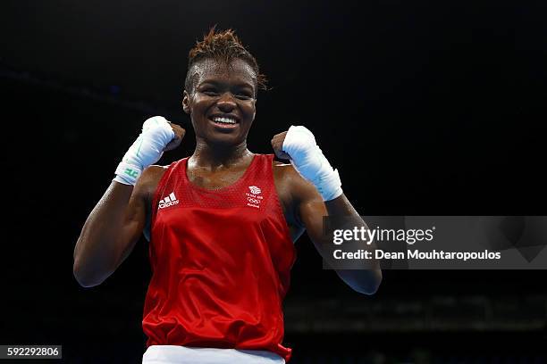 Nicola Adams of Great Britain celebrates winning the gold during the Women's Fly Final Bout against Sarah Ourahmoune of France on Day 15 of the Rio...